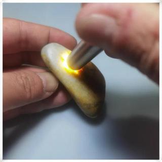 石仓和田玉鉴赏:火焰皮和田白玉手把