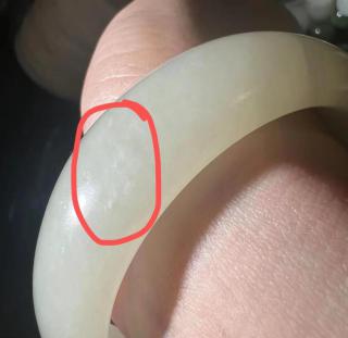 和田玉棉点问题:佩戴后出现的原因与解释