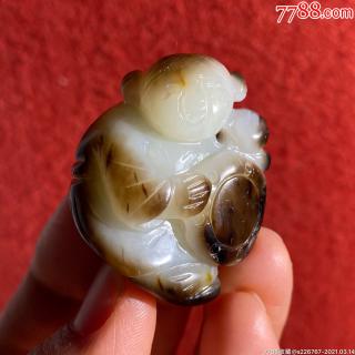 和田玉黑皮籽料童子���鼓雕件